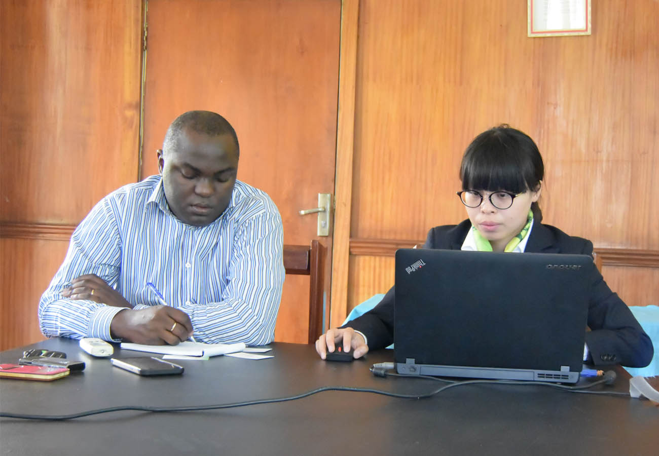 Chint Meter Executive at WENRICO - Uganda discussing meters and vending systems in Kampala - Uganda